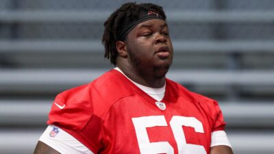 Desmond Watson in a red jersey