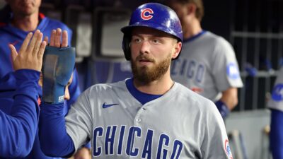 Michael Busch giving a high five