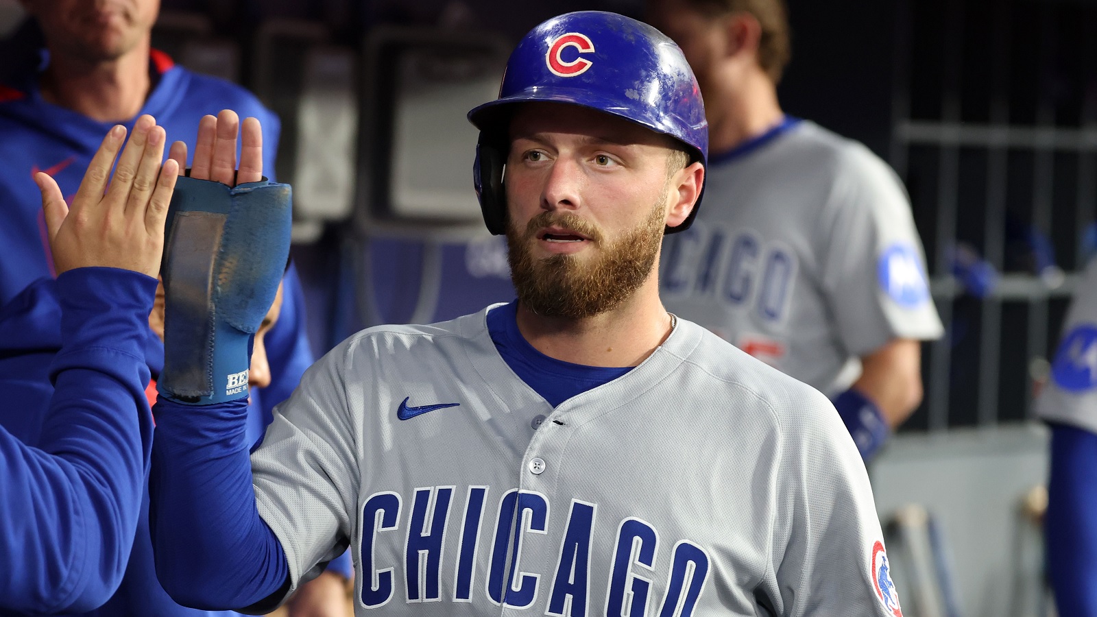 Michael Busch giving a high five