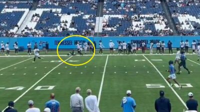 Treylon Burks hitting the turf hard