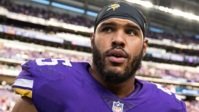 Anthony Barr looks on