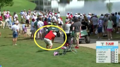 A PGA Tour volunteer sprints to track down an errant drive