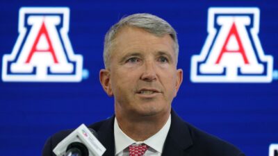 Brent Brennan at a podium