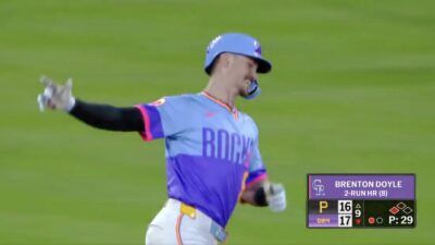 Rockies outfielder Brenton Doyle celebrating