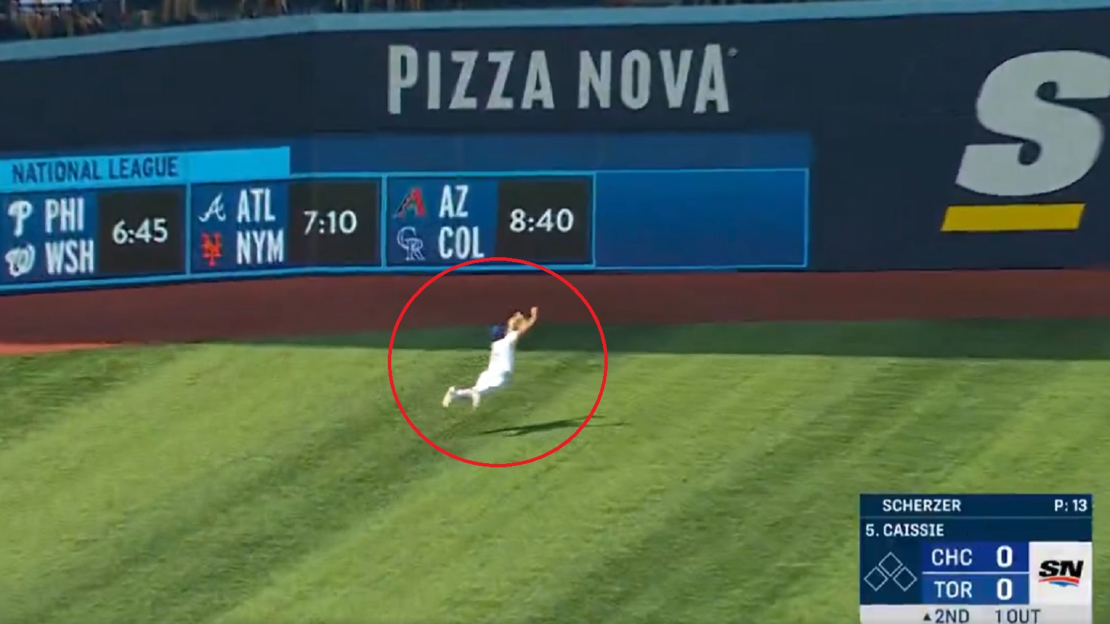 Davis Schneider lays out for a catch