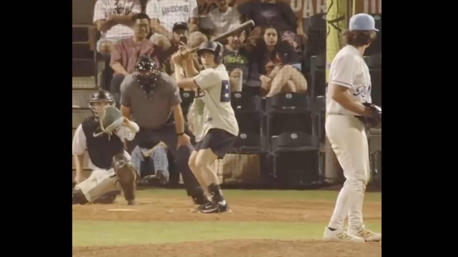 A fan named "Dixie" takes an at-bat during a Portland Pickles fan appreciation night