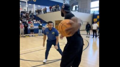 Jaylen Brown playing 1-on-1 with Wheeler High School assistant principal Barry Bowdre Jr.