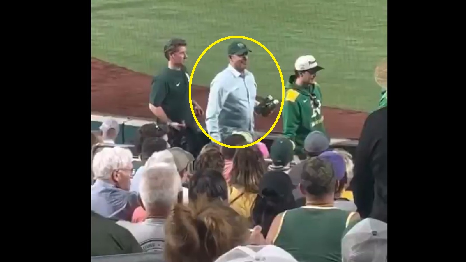 John Fisher at a baseball game