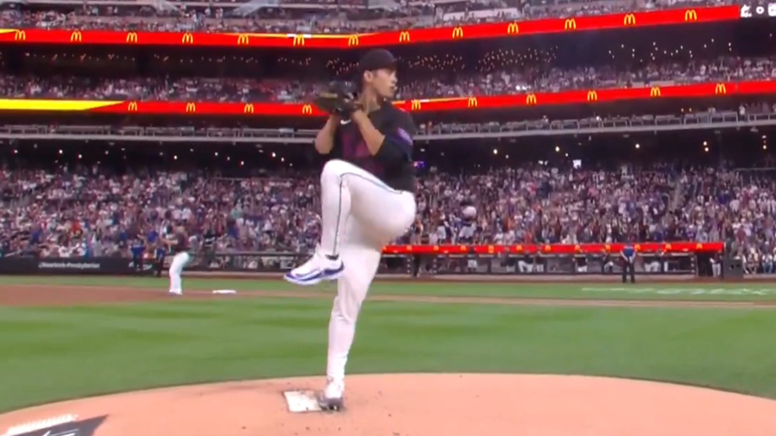 Jonah Tong on the mound for the Mets