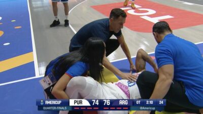 Jose Alvarado on the floor in pain