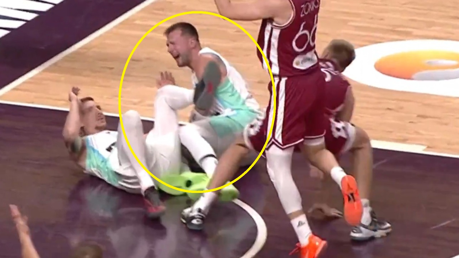Luka Doncic on the ground in pain
