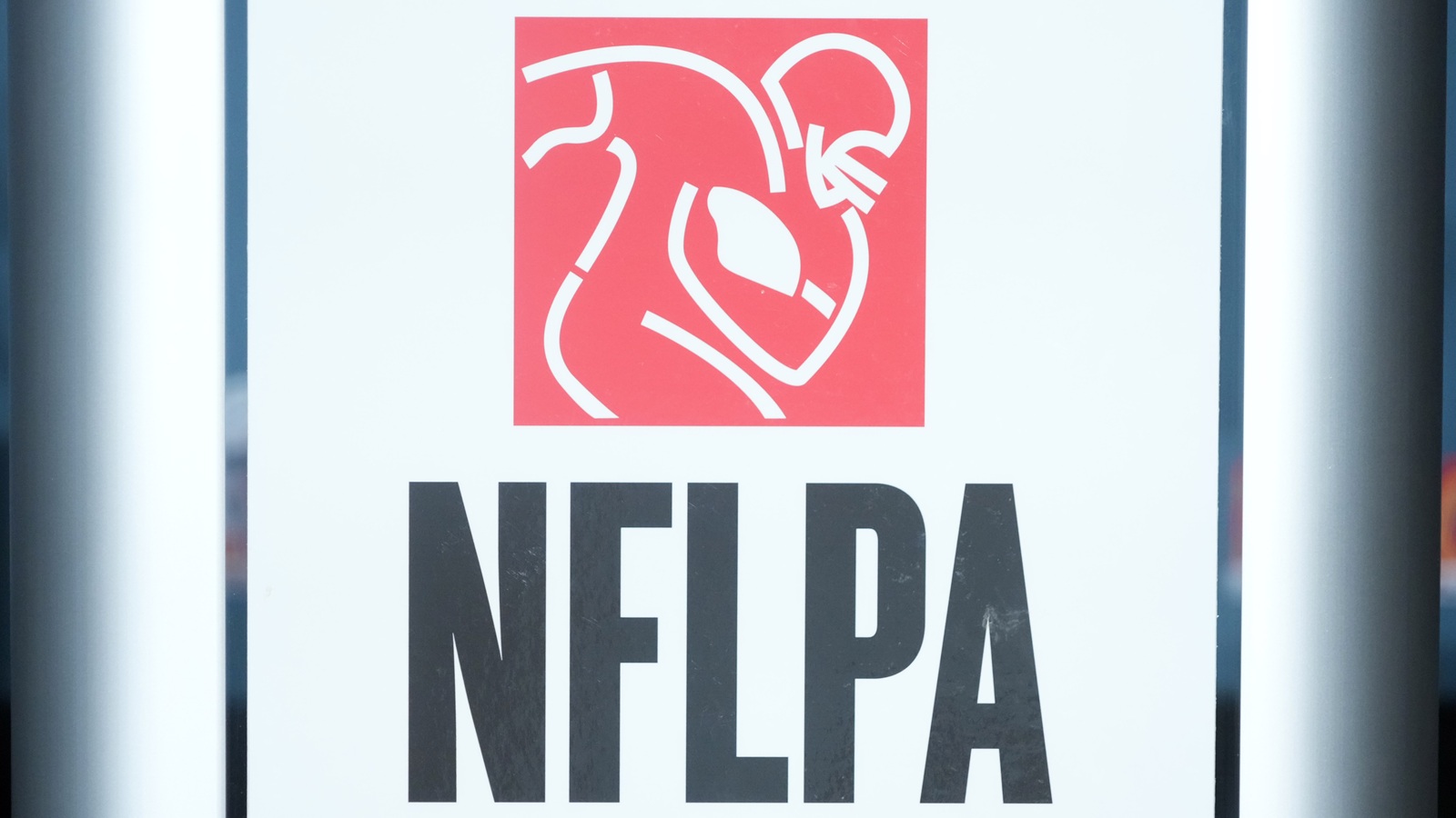 The NFLPA logo at a press conference