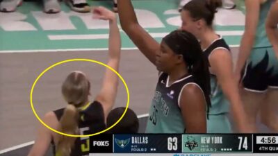 Paige Bueckers mocking an opponent