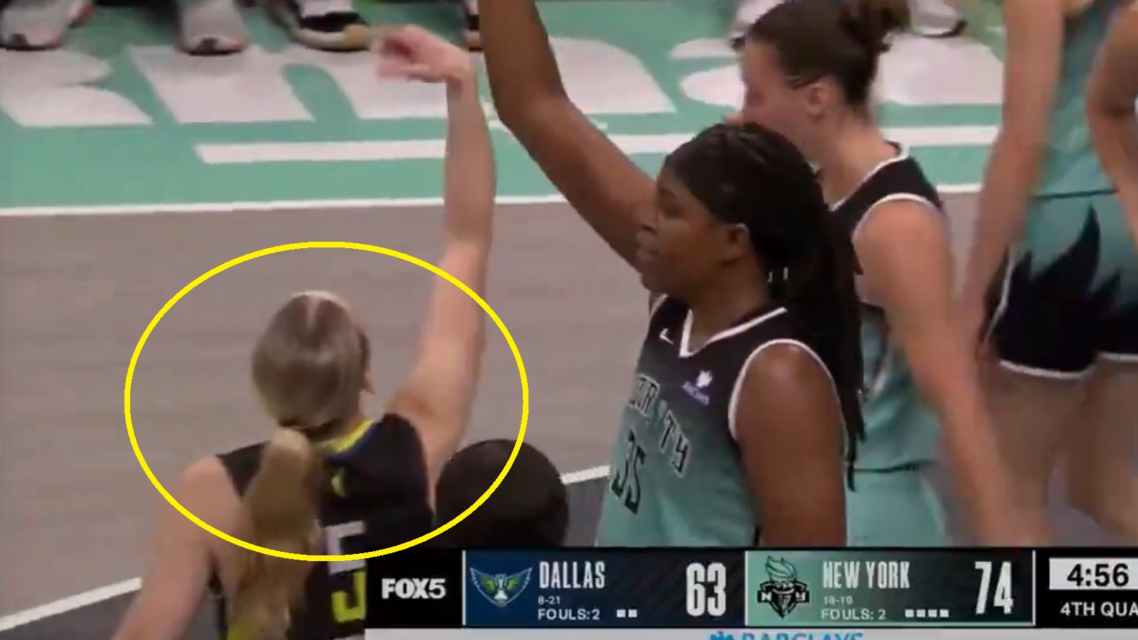 Paige Bueckers mocking an opponent