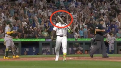 Randy Arozarena kisses his bat after hitting a home run