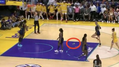 Sophie Cunningham reacting to a green dildo on the court