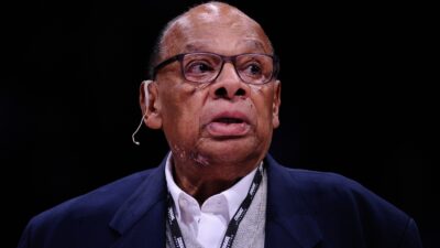 George Raveling looks on