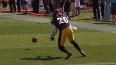 Kaleb Johnson tries to field a kickoff