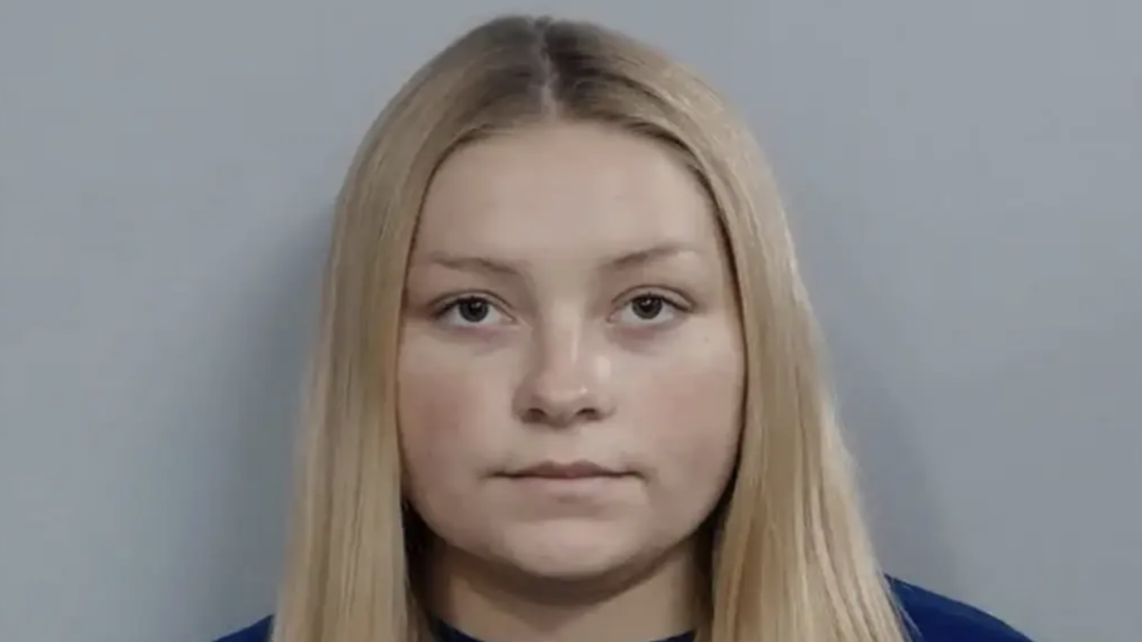 Laken Snelling poses for a mug shot