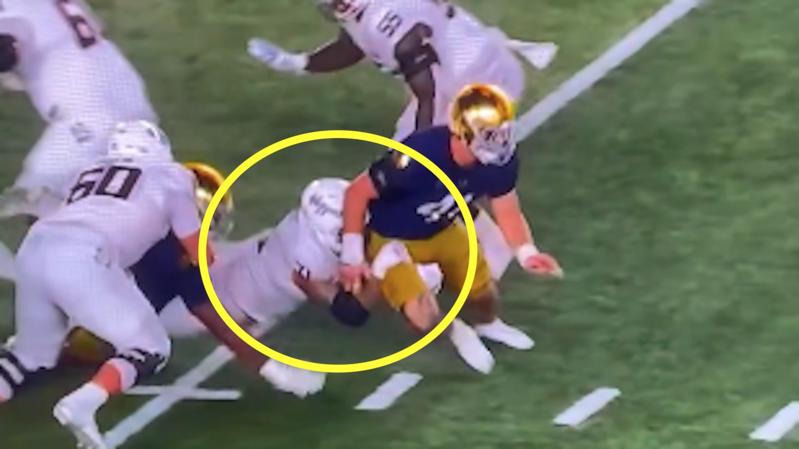 A Texas A&M player gets away with a hold