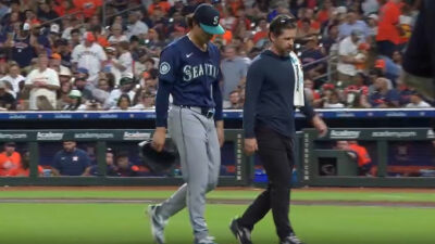 Mariners pitcher Bryan Woo leaving a game with injury