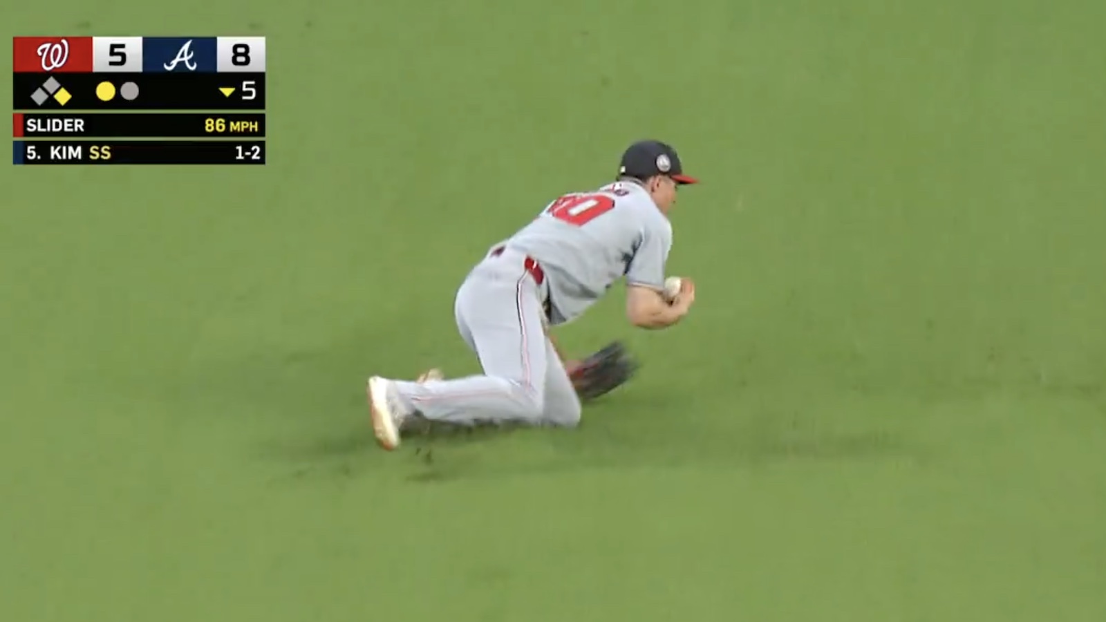 Nationals center fielder Jacob Young making a catch with his off hand