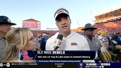 Ole Miss coach Lane Kiffin being interviewed after his team beat LSU