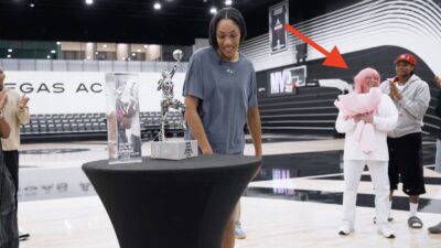 Mark Davis in a pink wig in support of Aces star A'ja Wilson