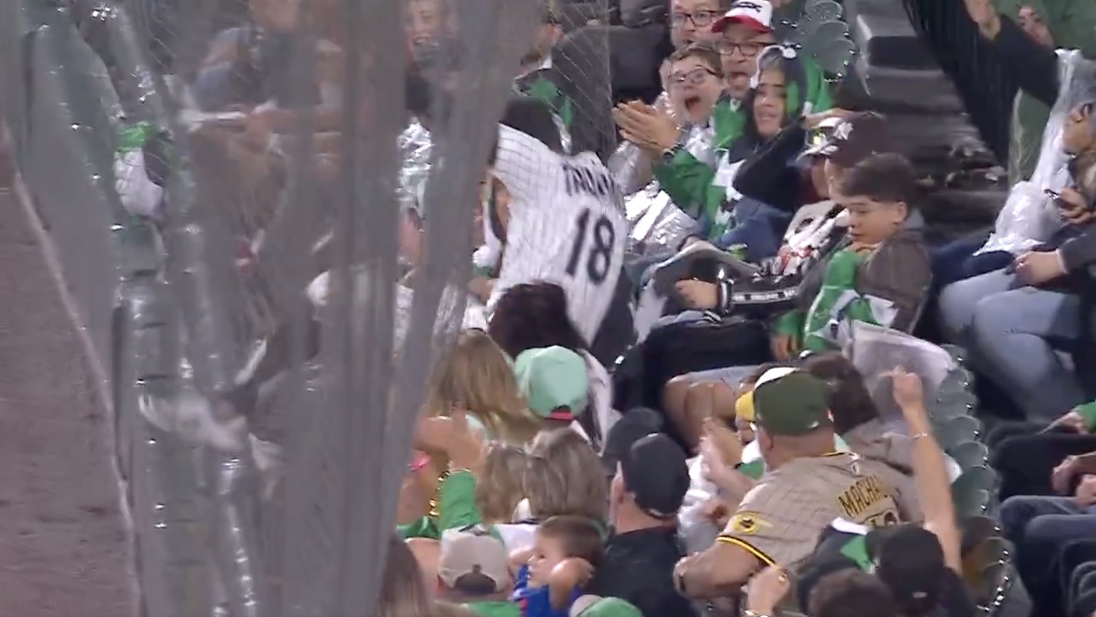 Mike Tauchman falling into the net to make a catch