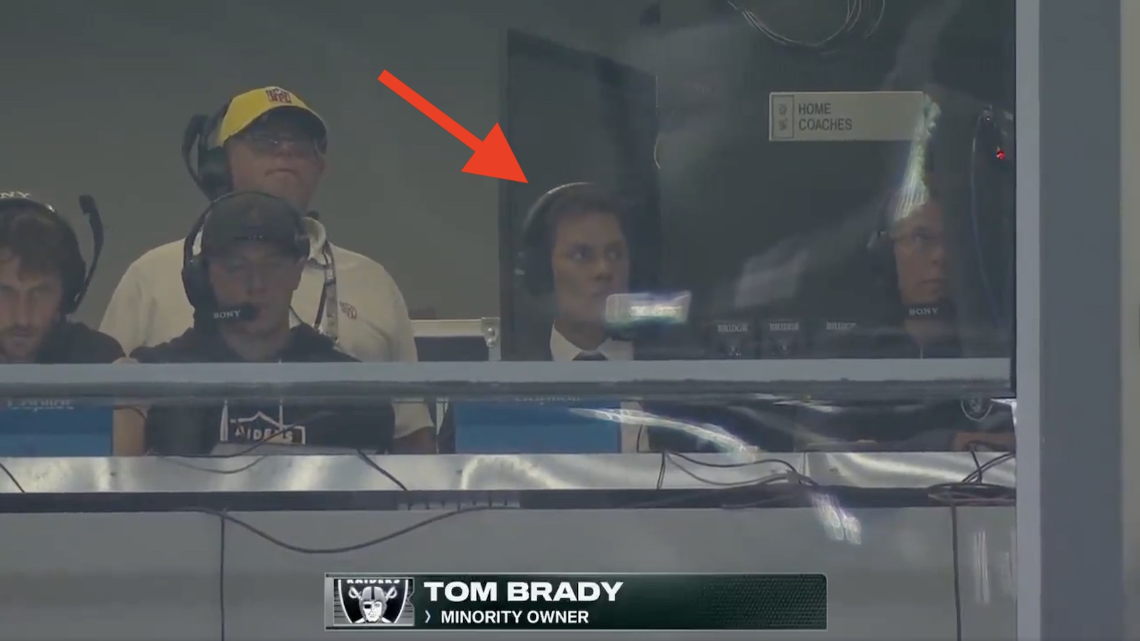 Tom Brady in the Raiders coaches' booth