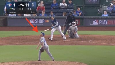 Blue Jays catcher Tyler Heineman pitching against the Royals