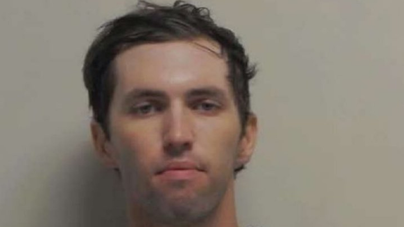 Tyler Robinson in a mug shot