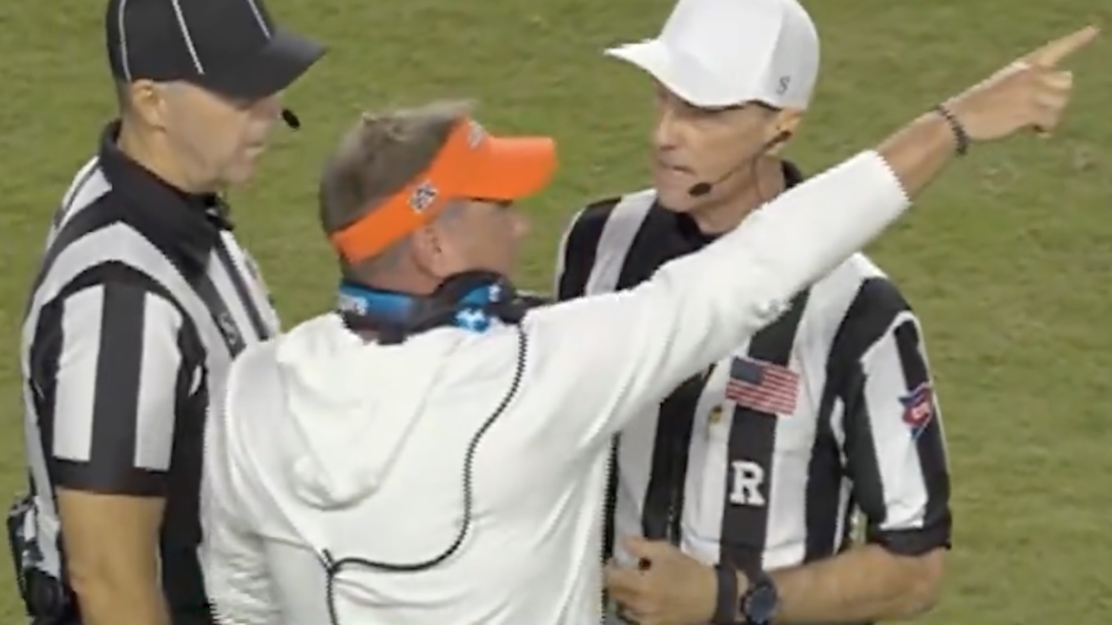 Hugh Freeze argues with the officiating crew
