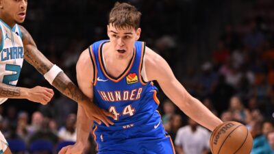 Nikola Topic dribbles on a defender