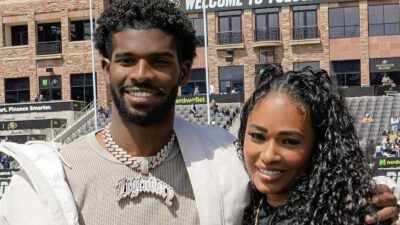 Shedeur Sanders poses with his mother Pilar