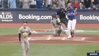 Vladimir Guerrero Jr admires a home run
