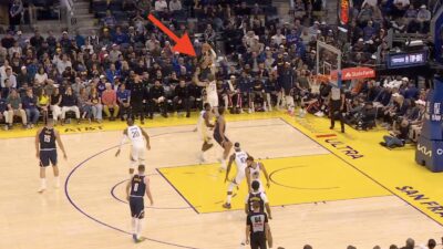 Aaron Gordon shooting a three-pointer during the Nuggets' game against Steph Curry and the Warriors