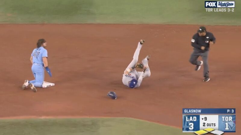 Blue Jays' Addison Barger kneels on second base after Dodgers get him out to end Game 6 of the World Series