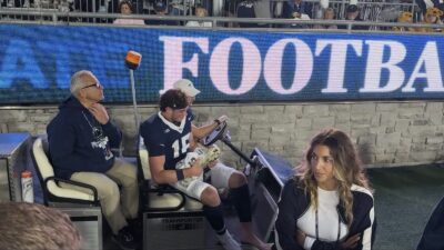 Penn State QB Drew Allar being carted off the field