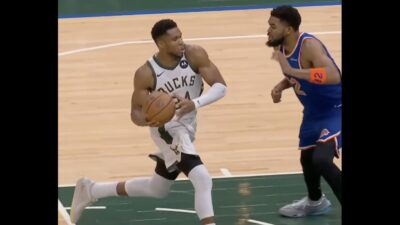 Bucks star Giannis Antetokounmpo making a move against Knicks center Karl-Anthony Towns