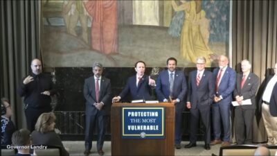 Jeff Landry giving a press conference