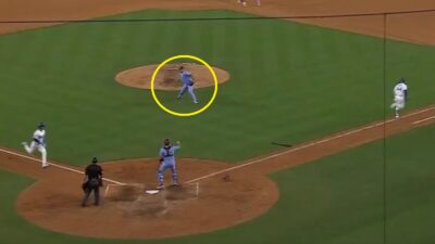 Orion Kerkering throwing to the plate