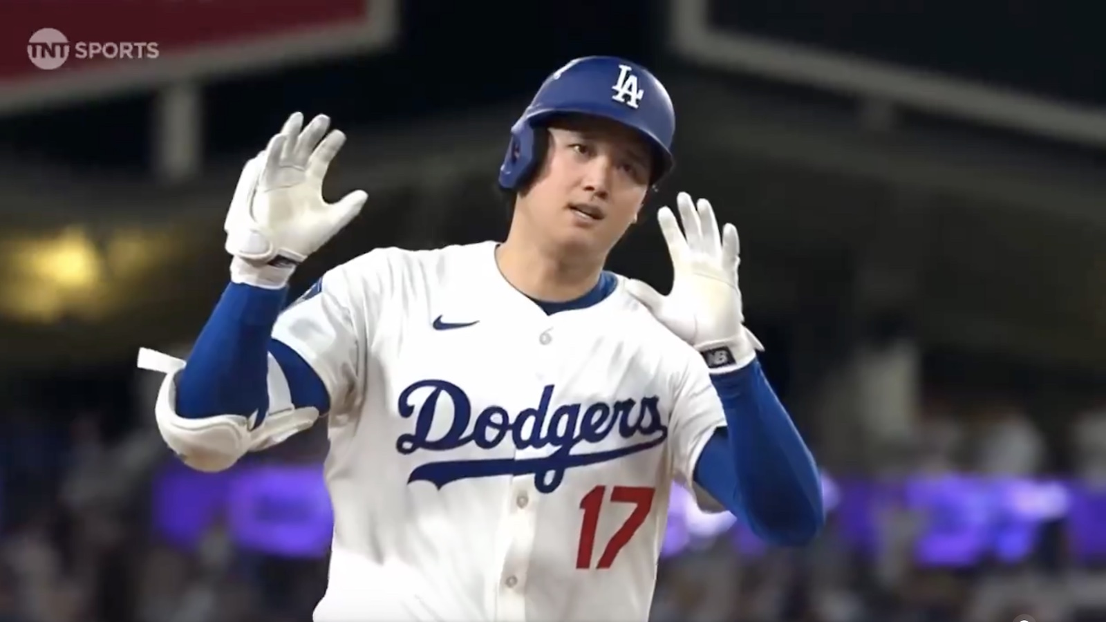 Dodgers star Shohei Ohtani celebrates after hitting a home run in game 4 of the NLCS