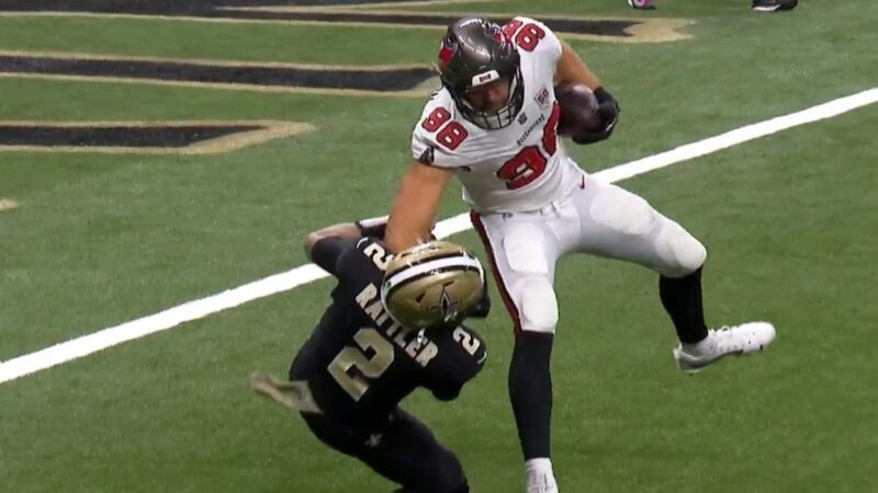 Spencer Rattler getting stiff-armed to the ground