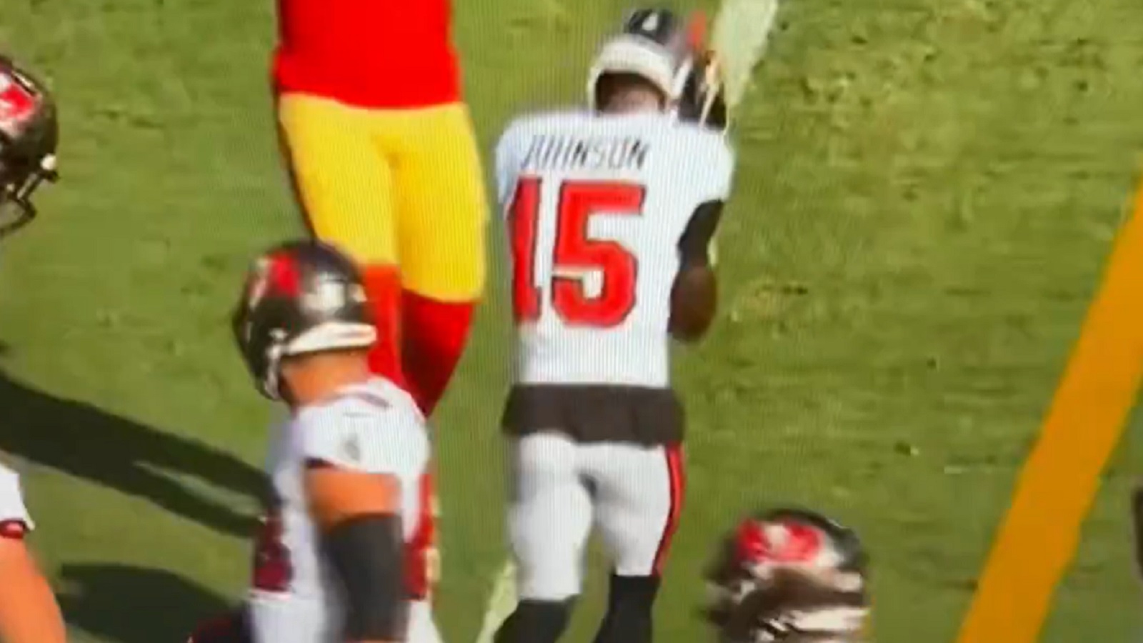 Tez Johnson with his hands covering his face