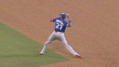 Vladimir Guerrero Jr. throwing to third base during Game 3 of the Dodgers-Blue Jays World Series