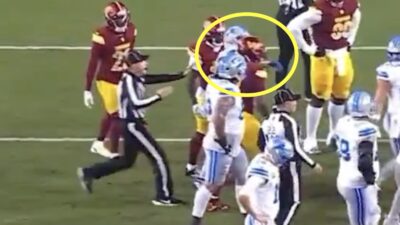 Amon-Ra St. Brown throws a punch at Daron Payne