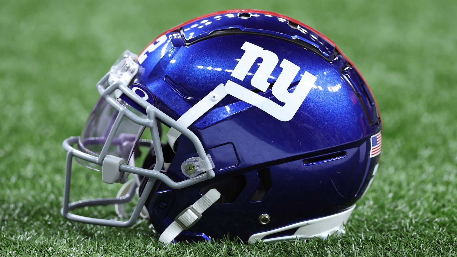 A Giants helmet on the field