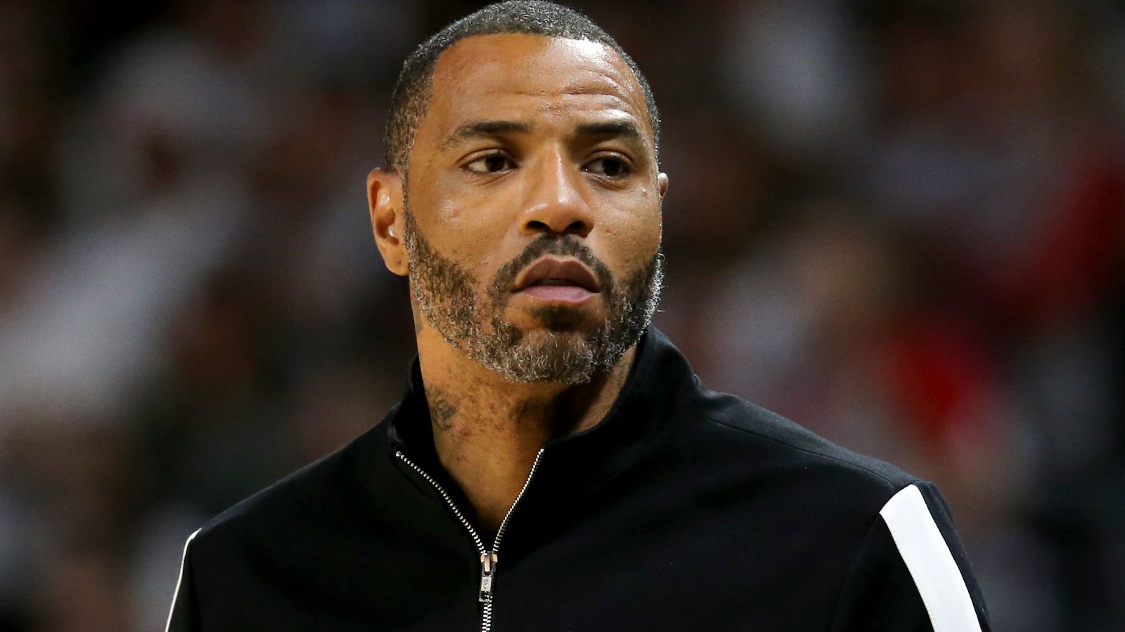 Kenyon Martin looks on