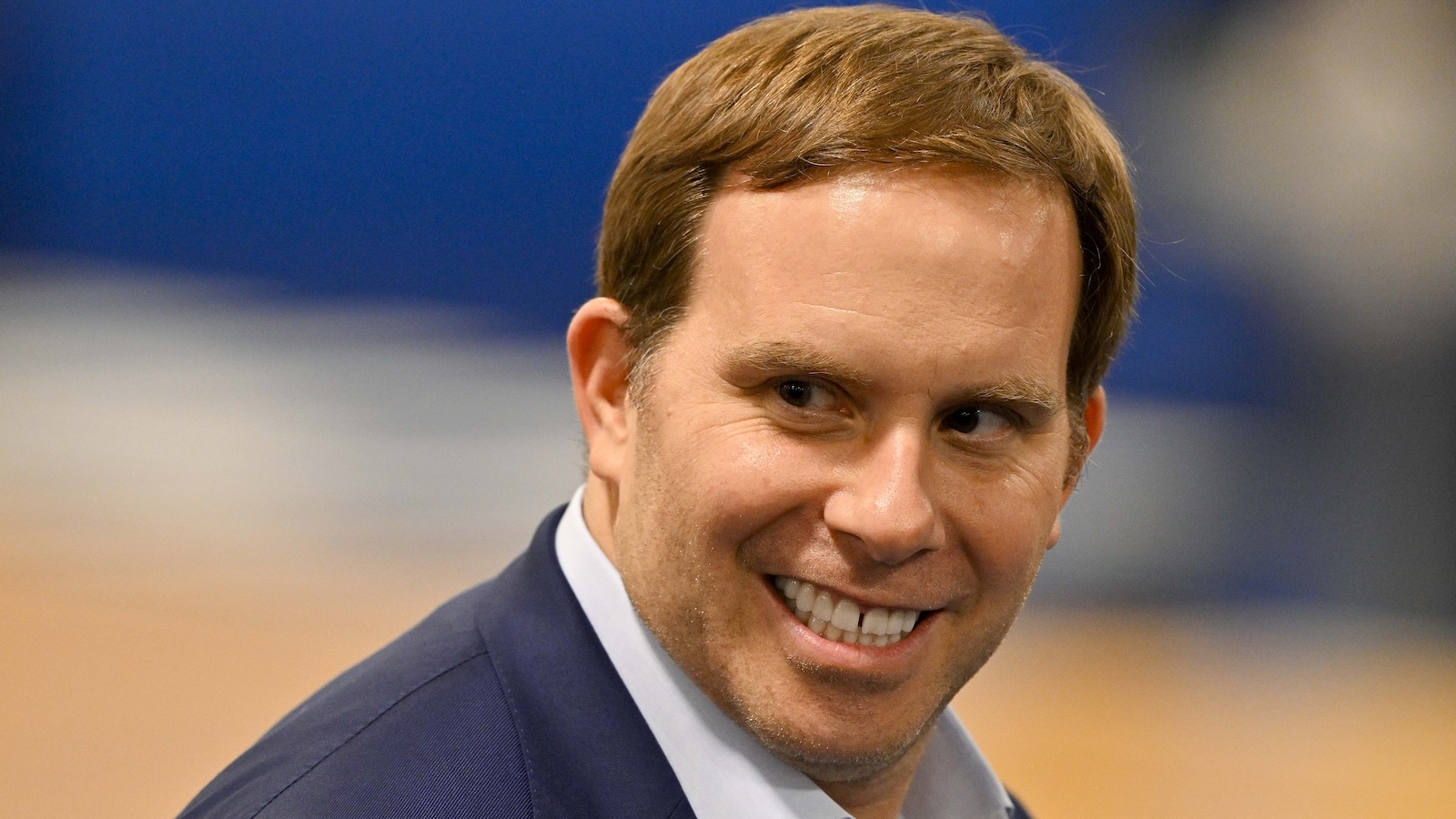 Patrick Dumont looks on